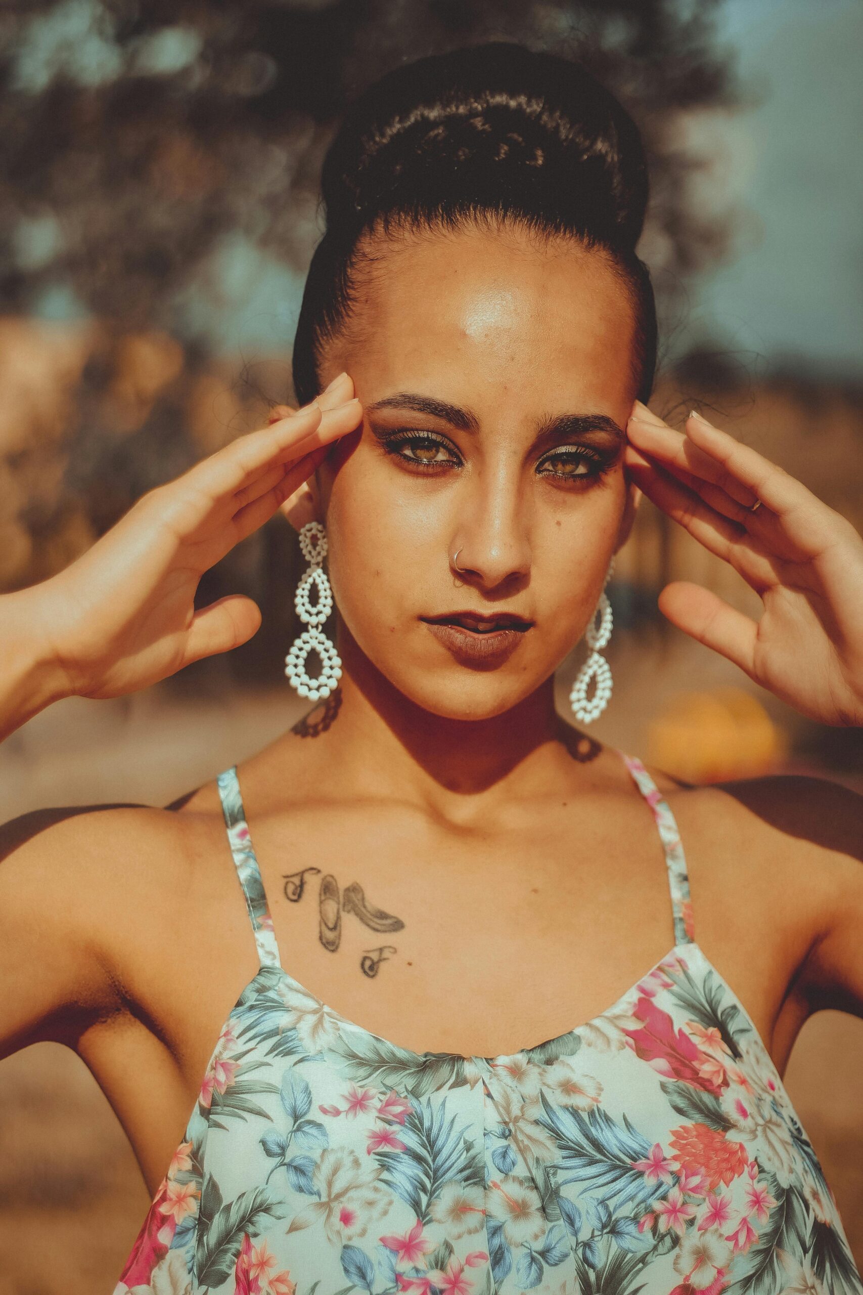 Woman Wearing Earings and Glamour Makeup